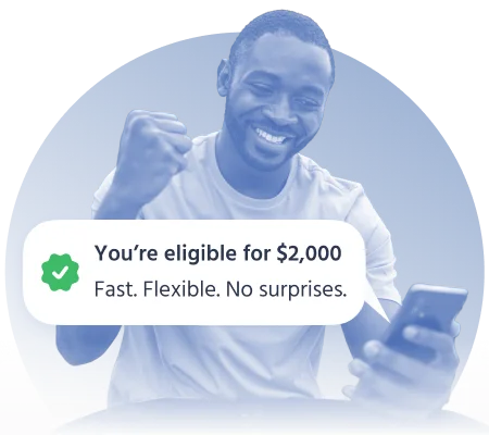 Excited man receiving loan eligibility notification for $2,000 on his phone