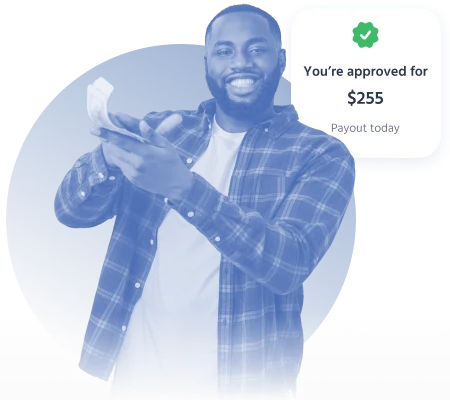 Smiling man holding $255