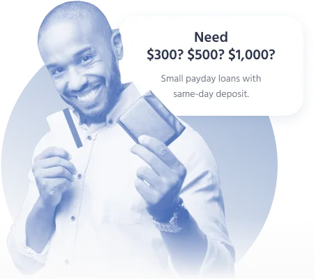 Smiling man holding a credit card and wallet