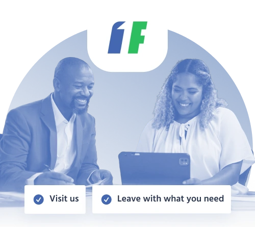 Friendly in-store consultation at 1F Cash Advance, reviewing loan details together