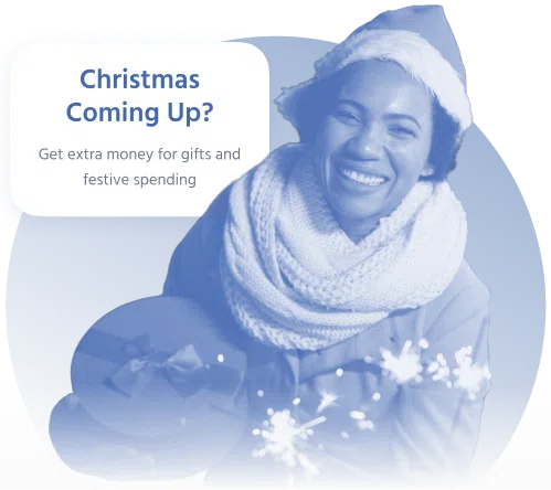 Smiling woman in winter clothing holding a wrapped Christmas gift and sparklers after receiving a holiday loan from 1F Cash Advance